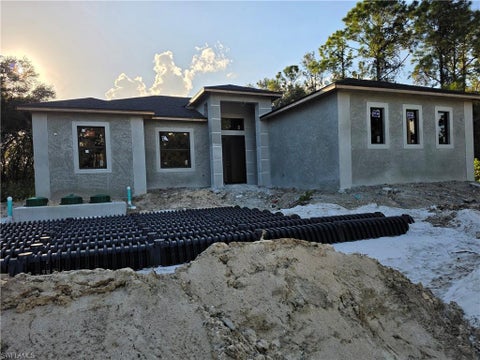 Photo of 1519 Calvin AVE, LEHIGH ACRES, FL 33972 (MLS # 226034620)