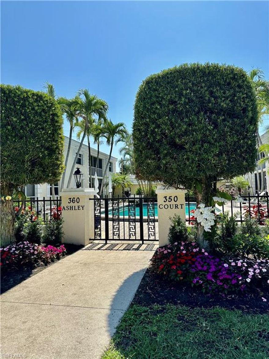Your cozy SWFL getaway in the heart of Old Naples awaits! This first floor, NW corner unit has 2 spacious master bedrooms each with large walk-in closets and ensuite baths. Hurricane impact windows and sliders, electric hurricane shutters on lanai, plantation shutters throughout, fresh paint, new carpet, and a NEW 2022 AC, water heater, and dryer. The kitchen is light, bright and updated with white quartz countertops. Enjoy your morning coffee or afternoon cocktail on your lanai overlooking the quiet, oversized community pool and central courtyard. Ashley Court is a small, 8-unit complex just blocks from historic 3rd Street South's dining and shopping and our pristine white sand beaches for soaking up the sun and watching fabulous sunsets. Large storage closet for all beach gear and bikes conveniently located from your front door on the side of the carport with 1-assigned, covered parking space. Make this your Winter home away from home and indulge in the best of Naples' downtown living.