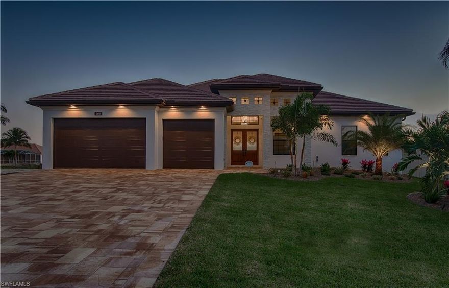 Stunning newer construction home located on an over-sized Southern Exposure lot.  This Direct Gulf Access home comes loaded with several high-end options including coffered ceilings, beautiful custom laid porcelain plank tile, and private beach along the water!  Chefs’ kitchen features Kitchen Aid appliances and beautiful cabinetry all open and overlooking the living room. Relaxing living room overlooks the pool and waterway via the wall-to-wall PGT impact sliding glass doors. Custom coffered ceilings and designed bedrooms. Lots of outdoor living space along with the “Cabana” extra room could be used as an office or additional suite. Summer kitchen with Gas Grill custom cabinets and built-in beverage cooler. Custom gas heated infinity edge pool with 2 stack stone gas fire features and Infinity edge spa overlooking the water. Dock with oversized Tiki Hut and lighting, Kayak Launch, Snook lights, built high on an upgraded raised and widened Seawall. Additional features include: Alarm System and Camera System, 500 Gallon in ground propane tank, Whole home generator.