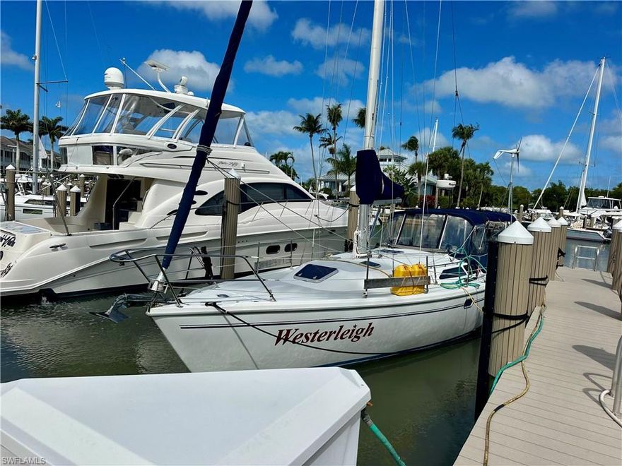 This is your chance to secure a 70-foot boat slip in one of Naples’ most exclusive waterfront communities—Windstar on Naples Bay. (AND... to complete the perfect Boater's Package, this owner is selling their lower level 3Bed/2.5 Bath Condo also - 1733 Gulfstar Dr. S Unit 302 located just down the sidewalk from this slip) Offering a 20-foot beam and fast, direct Gulf access, this premier slip in SPYC places you just minutes to open water, Naples Bay, and the pristine beaches of the Gulf.  From this protected yacht basin, cruise effortlessly to Keewaydin Island, Isles of Capri, Marco Island, or dock downtown in minutes to enjoy world-class dining and boutique shopping on the famous 5th & 3rd Avenues. Experience the Bayshore Arts District just outside the gates of Windstar, Celebration Park by boat & the Naples Botanical Gardens just across the street.  The marina has a dock master onsite daily for added security & you can enjoy the yachting  lifestyle with a private island clubhouse, pool and spa, showers, ice, pump-out services, and more.  All of this within the only gated Naples community that truly combines boating, golf, and tennis—just one mile from downtown. Fuel & bait are located close by at Bayview Boat Ramp.  This is Naples yachting at its finest for a fraction of the price across the bay & close to everything you need.