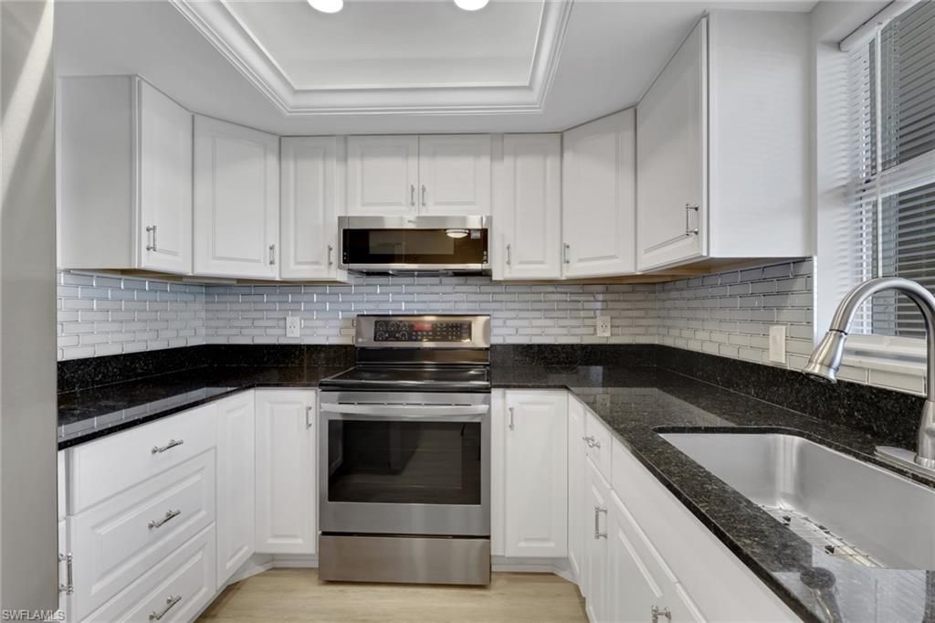 Photo of 5499 Rattlesnake Hammock RD #A-207, NAPLES, FL 34113 (MLS # 226016014)
