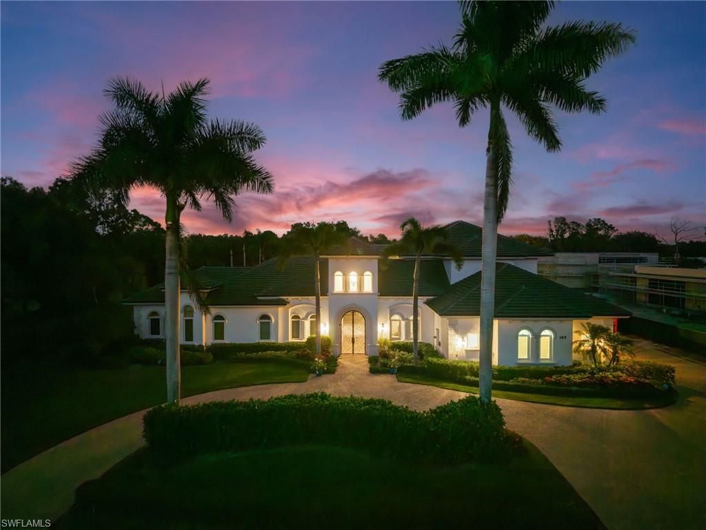 Photo of 185 Tupelo RD, NAPLES, FL 34108 (MLS # 225079634)