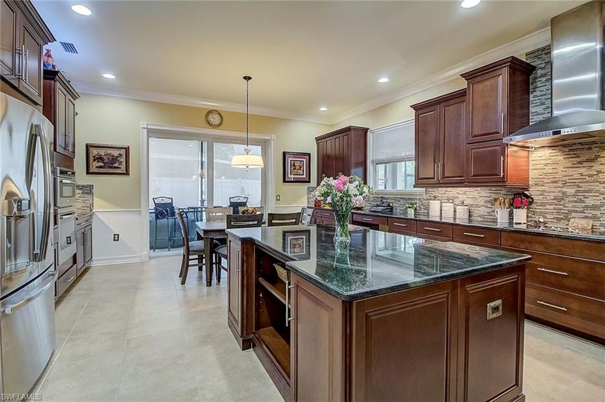 **Motivated Seller** Welcome to the Highly Desirable Family Friendly Community of McGregor Reserve.Volume Ceilings with Crown Molding.The open floor plan is great for entertaining  The Well Appointed Eat In Kitchen with a Large Central Island,Top of the Line Cabinetry with Soft Close Doors & Drawers and a Large Pantry with Adjustable Shelving is a Dream! Retreat to the Large Master Suite with two Large Walk In Closets,a Large Soaking Tub & a Separate Walk In Shower. Through the triple pocketing sliders you can relax and enjoy Expansive 50 x 30 screened lanai  w/in ground salt water pool, spa & pool bath.Upgrades include Impact Glass Windows,Doors. Irrigation System on well. McGregor Reserve is conveniently located close to shopping, dining, & entertainment great public and private schools
2nd fl Hobby Rm or second family room. Grand 2 Story Foyer w/wainscoting & crown molding. Formal DR with custom built-ins, BR/office on 1st floor has full bath and walk in closet.  3 of the guest bedrooms are en suite. Community pool& dog park. Seller is open to flexible terms and giving painting credit