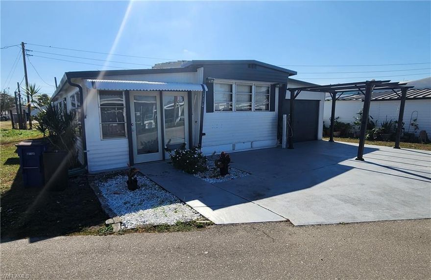 Difficult To Find Such A Nice Home Under $60K - Wow! * Not 55+ Age Restricted Community w/High Fees - Or ANY Fees!!! * No Pet, Age, Vehicle, Or Rental Restrictions! * Great Rental Possibilities * Membership To The HOA is Voluntary - Only $28 Per Month - Call HOA For Info * Property Is Neat/Clean & Move-In Ready - Except No Kitch Appliances * New Carpet & Fresh Paint * Metal Fold-Down Storm/Shade Awnings * Affordable 2 Couple Snowbird Or Rental Sharing Possibility - The Way It Is Set Up Could Accommodate A 2 Couple Rental * Why Pay Rent - Just Buy This Home! * There Is Ample Parking For 2 Or 3 Vehicles * Very Few Homes Have An Enclosed Garage * Central AC * 2 Bed, 2 Full Baths, Den - Could Easily Be 3rd Bedroom, 1 Car Garage * Approx 1,086 Sqft Living Area & Approx 1,592 Total Sqft - See Tax Record Foot-Print   The Community Is Fixing Things Up & Removing Damaged Homes * Very Convenient Location - Just Minutes Away From Shopping - By Sidewalk * Just Minutes Away From US41 & I-75 *  Home Is Sold AS-IS, But Inspections Are Welcome * See The Enclosed Visual Tour Link *