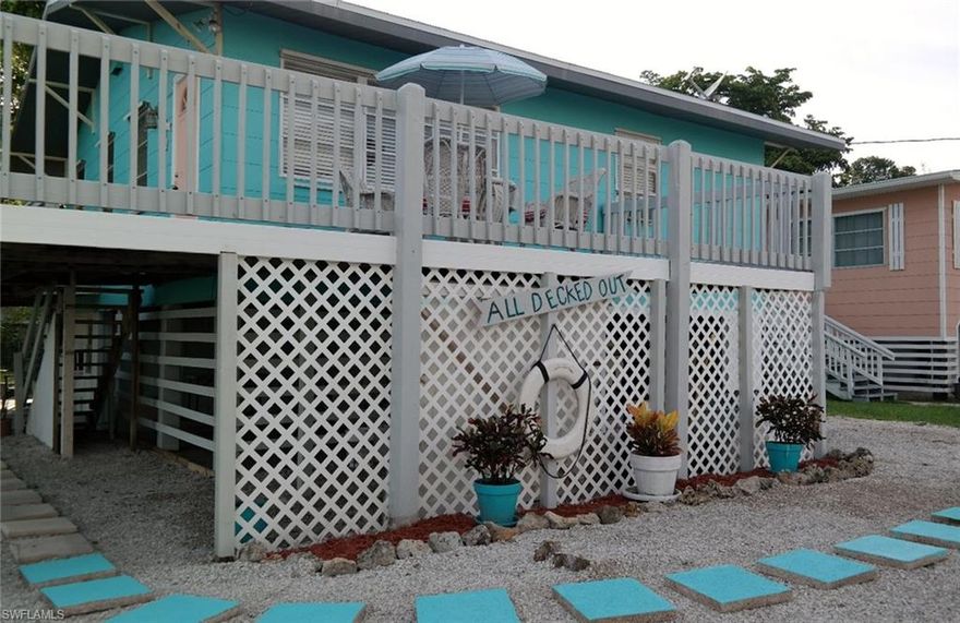 Located on a quiet street less than a mile from Times Square, this cottage is an original 1950s beach getaway. The cottage has an open layout with a galley kitchen, open living/dining area and two bedrooms, one bath upstairs. The downstairs has a small one bedroom apartment with a full bath and kitchen. One of the most popular amenities this property has to offer is the large deck. The deck was originally built in the 1970s but has been rebuilt and enlarged several times since then. This is a great place to sit and watch the world go by. The properties next to the cottage are owned by Chapel By The Sea so there is an unobstructed view of Estero Blvd, and if you look closely, of the gulf. Needs a little TLC, but is worth the effort. The rental potential for the property is excellent as this is a weekly rental street. Also large backyard if you want a pool. Chapel St. has a great beach access and you can walk to everything.