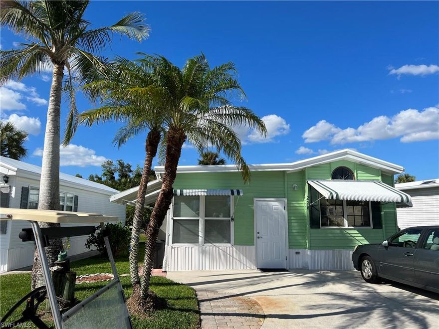 Welcome to Imperial Wilderness, an active, gated, 55 plus community where you OWN the land.  This home looks so tiny on the outside that you will be surprised at the size once you enter the home.  Both baths are up to date and very roomy.  The second bath has plenty of space to add a shower making this home a 2 bath home. Both bedrooms are large enough to accommodate a queen bed. This home is partially furnished.  The patio furniture stays as well as the Sunsetter Awning making it a great place to enjoy a cup of coffee in the morning. The windows in the living area are big and bring in lots of light from our beautiful SWFL sunshine.