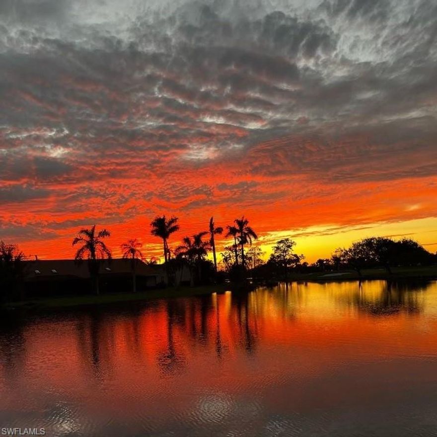 Imagine this as your evening and daytime view! The tranquility that comes from watching ducks swim in the pond, and sparkling water is mesmerizing.  Tucked away on a cul-de-sac, you will be amazed at this completely renovated charming villa with all its detail oriented touches.  The kitchen boasts a large quartz waterfall style island and matching backsplash.  Built in custom kitchen cabinets are all soft close with plenty of storage.  Samsung appliances from kitchen to laundry room. The chic and unique lighting fixtures and electric fireplace provide a beautiful ambiance depending on mood or occasion. Enjoy the pond and golf course view also from the spacious master bedroom. Dual vanity sinks and Italian tile adorn the master bathroom. Waterproof flooring is throughout the entire home.  Double impact windows and a rolling metal shutter are included.
The split floor plan provides plenty of privacy, while still embracing an open floor plan.  This villa exudes pride of ownership with many finishing designer touches at every turn.  The community pool is just two doors down. Why wait- start enjoying this beautiful slice of paradise - all is done for you- start living the dream!