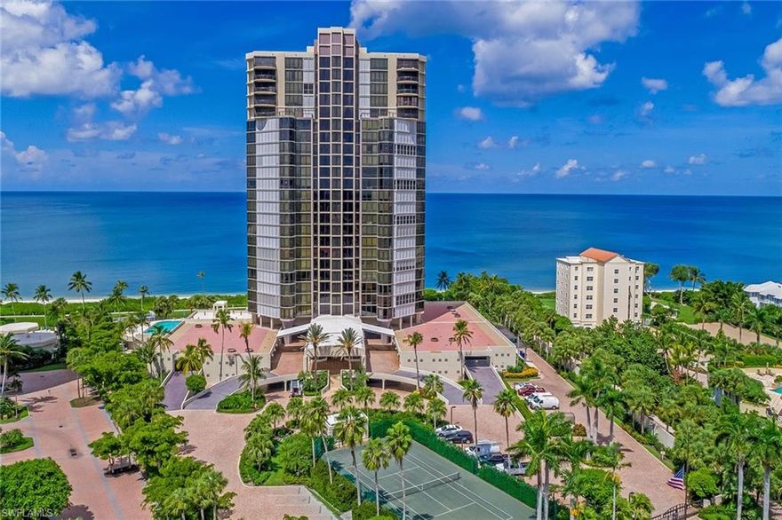 Unparalleled location and view. Welcome to beach and Gulf-front living at the prestigious Le Parc community in Park Shore. This gorgeous, spacious 4-bedroom, 4-bath condominium lives like a single-family home and combines elegance, luxury and coastal ambiance. The sun-filled unit features a huge great room that opens to the large tiled lanai, perfect for entertaining with Gulf views as the backdrop. Well-appointed kitchen boasts island, breakfast bar, pantry, pass-through window, wet bar with beverage cooler, built-in desk, white cabinetry and stainless steel appliances, plus adjacent dining area. The master suite provides a peaceful oasis with sitting area, 2 large walk-in closets and en-suite with dual sinks and vanities, enclosed WC with bidet, shower and separate jetted tub. Three additional bedrooms, on the split plan, with full baths for guests' privacy. Take in sweeping beach and forever Gulf views and stunning nightly sunsets from the 2 lanais, one of which is an enclosed Florida room. Bring your furry friend, two cats or one small dog allowed. Amenities include a resort-style pool, two community rooms and tennis courts. Don't miss this amazing piece of beachfront paradise!