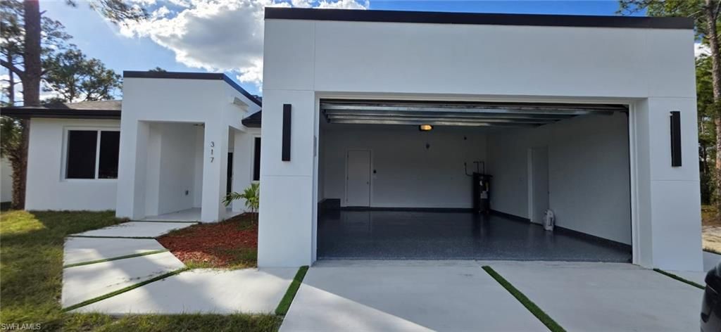 Photo of 718 Robert AVE, LEHIGH ACRES, FL 33936 (MLS # 226006414)