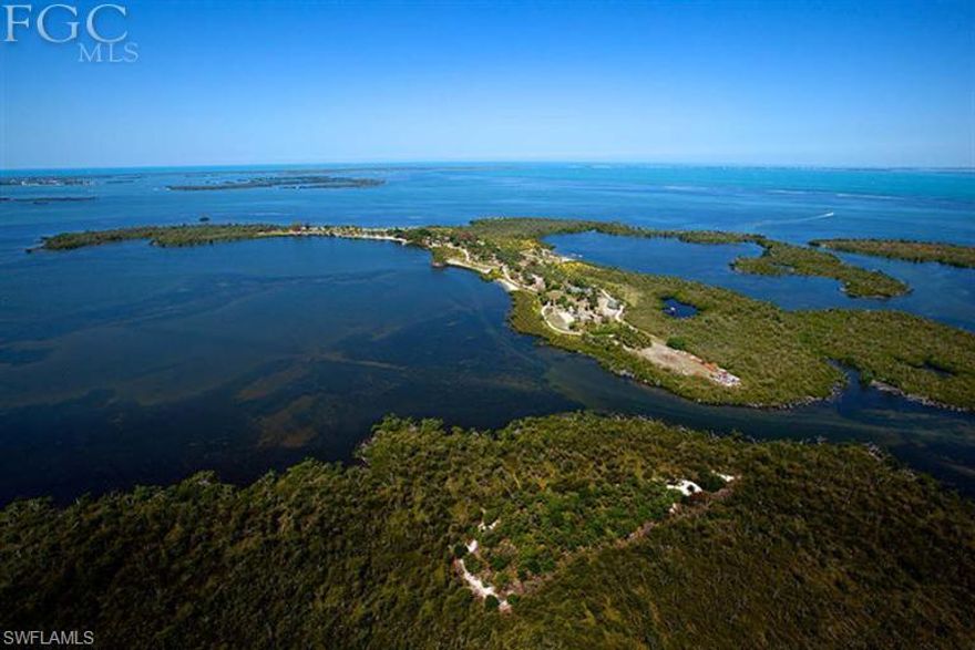 Welcome to an extraordinary lifestyle. A private island paradise off Florida's sunset coast. Little Bokeelia Island is 100+ acres of romantic splendor offering majestic tropical living. From the Spanish-style estate home with a private guest wing to the old Florida village just a short stroll away, you are sure to be overcome with a sense of peace and serenity the moment you step off your boat. Whether your desire is to spend the days swimming, walking the nature trail, sunning on the beach, or playing tennis, you are sure to find your own magic amid the tropical tranquility. Your insurance policy is the value created by the current owners' foresight in putting in place the utilities necessary to develop 29 large waterfront lots. Or if history is your motivator, then you will be taken aback with the long, storied past of the island's original residents and visitors including the Calusa Indians, Charles Burgess and Thomas Edison. It's rare, it's unique, it's simply magical.