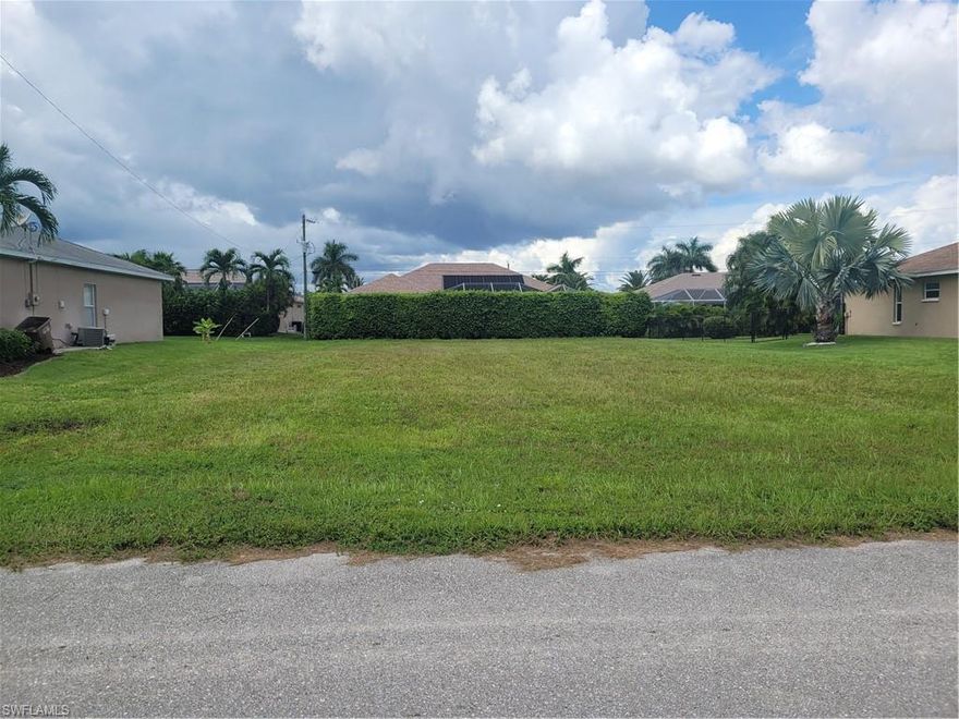 LOCATION !!! Property is in the Highly Desirable and sought-after community between Cape Coral Parkway and Cape Harbor. This is a wonderful level lot on a quiet street with manicured landscaping in a great neighborhood. Close to restaurants, schools and shopping and everything Cape Coral has to offer. Make Your Offer Today.  Assessments are IN AND PAID in full!