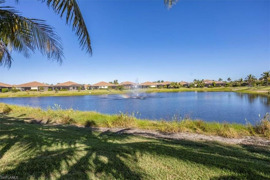 Welcome to your stunning villa, formerly a model home, featuring numerous upgrades and designer touches throughout. Highlights include specialty ceilings, elegant wall treatments, and a neutral palette complemented by high ceilings and an open floor plan—perfect for entertaining.

The split floor plan offers ultimate privacy, with the guest suite on one side and the primary suite on the other, both boasting gorgeous Long Lake views. The gourmet kitchen is ideal for the home chef, equipped with a gas range, stainless steel Whirlpool appliances, granite countertops, a tiled backsplash, and 42-inch wall cabinets. The home also includes a whole-house water system, and smart home features with built-in speakers and an Elan system that allows you to monitor and control heating and cooling remotely.

The spacious lanai is equipped with electric storm shutters, providing protection for your outdoor furniture and home. Impact windows and doors enhance security from storms and help buffer outdoor noise. Throughout the home, designer accents such as beams and wall treatments add a stylish touch.

The primary bedroom features two walk-in closets, and the primary bathroom offers dual sinks, a large walk-in shower, and a separate water closet. The versatile den, with built-in shelving and a daybed, can serve as a third bedroom or guest retreat. Enjoy durable, hard-surface tile floors throughout, with plush carpeting in the bedrooms.

Relish watching wildlife and birds as they roost almost every evening. The home includes a spacious two-car garage, an in-home laundry room with washer, dryer, and additional storage cabinets, and a paver driveway.

Just a short walk from the clubhouse with a pool and fitness center, your new villa is perfectly located near beautiful beaches, shopping, performing arts venues, and baseball parks. This stunning villa is offered turnkey furnished—just bring your clothes and toothbrush and start enjoying the paradise lifestyle this home offers!