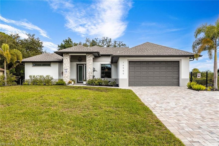 Welcome to the nicest home in Daughtrey’s Creek!  Built in 2022, this stunning 3 bedroom, 2 bathroom custom built home on nearly half an acre offers top notch beauty and quality throughout. It has been meticulously cared for, and every detail reflects outstanding quality and modern design.  You’ll appreciate the expansive open floor plan with gorgeous tile plank flooring throughout the house, the soaring 10’ cathedral/tray ceilings, and impact doors and windows throughout allowing plenty of natural light and peace of mind.  At the heart of the home, you’ll love the gorgeous kitchen with upgraded LG stainless steel appliances, a beautiful glass backsplash, and a huge island with quartz countertops along with plenty of cabinets.  The primary bedroom is truly a suite with a spacious bathroom offering a huge walk-in tiled shower, dual vanities, a freestanding tub, and two his/hers walk-in closets.  The enticing pool is screened and has gorgeous pavers with plenty of room for outdoor entertaining.  For added peace of mind and extra privacy, Storm Smart electric hurricane screens have been added on the lanai.  The owners have also added a fenced back yard, extended paver driveway, 10’ x 16’ shed, gutters around the entire home, and a Generlink switch for a portable generator.  The salt water pool can be enjoyed all year with a pool heater and solar pool cover.  Have an RV or visitors that do?  There is 30-amp hookup on the property for an RV.  The concrete walkway surrounds the home for convenience.  The Icynene sprayfoam insulation is efficient and is in the home and garage.  This home is located in the back of the neighborhood for less traffic and backs up to a protected, serene preserve that will remain undeveloped.  The owners have added 50K towards upgrades to this home since owning it.  Daughtrey’s Creek is known for being one of the most sought after neighborhoods in North Fort Myers with nice neighbors and larger lots.  It is country living with only a short drive to restaurants, golf courses, grocery stores, and I75.  There is not an HOA fee here and you can bring your pets, RV, boats, and other recreational vehicles to enjoy.  This home has never been flooded from any previous hurricanes.  Be sure to schedule an appointment to see this amazing home before it’s gone!