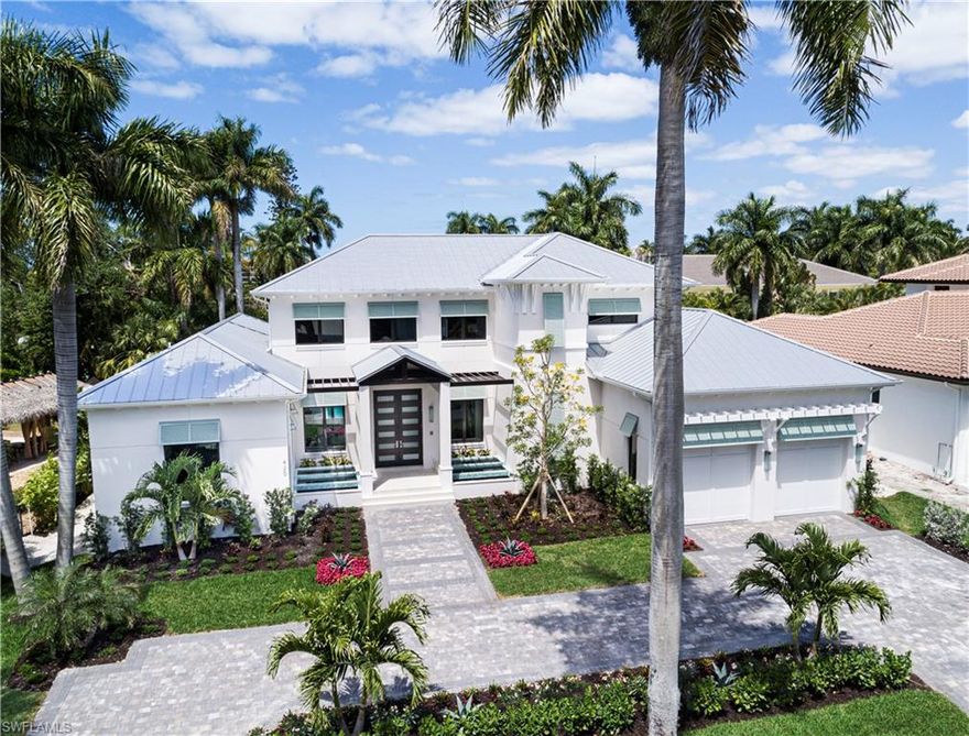 Premiere location and one of Naples's newest custom home offerings! This showcase residence was constructed by Gulfstream Homes, Kukk Architecture and Koastal Design Group. 425 Putter Point Dr. is a very quiet and lush treelined street west of Crayton Rd walking distance to the Moorings Country Club and short bike ride to the Moorings Beach Club. You can have it all in one of the most sought-after markets in Naples. 4478sqft under air, 4Br+Den, 6 Bath, 3 Car tandem garage with room for a lift and loaded with unparalleled finishes.  You will appreciate the artistic appeal of solid mahogany finishes at the front entry coupled with flowing water features and solid wood timbers.  This showcase masterpiece is all about intricate focal points, artistry and seamless flow as you move your way past the tranquil living quarters, inviting gourmet kitchen and spacious out door living areas. Pomeii Quartz throughout, Encore custom cabinetry, Thermador Appliances, Legno Bastone flooring, Andersen impact windows/doors, electric screens and shutters, 1000 gallon propane tank, 2 tankless water heaters, control 4 lighting and much more.