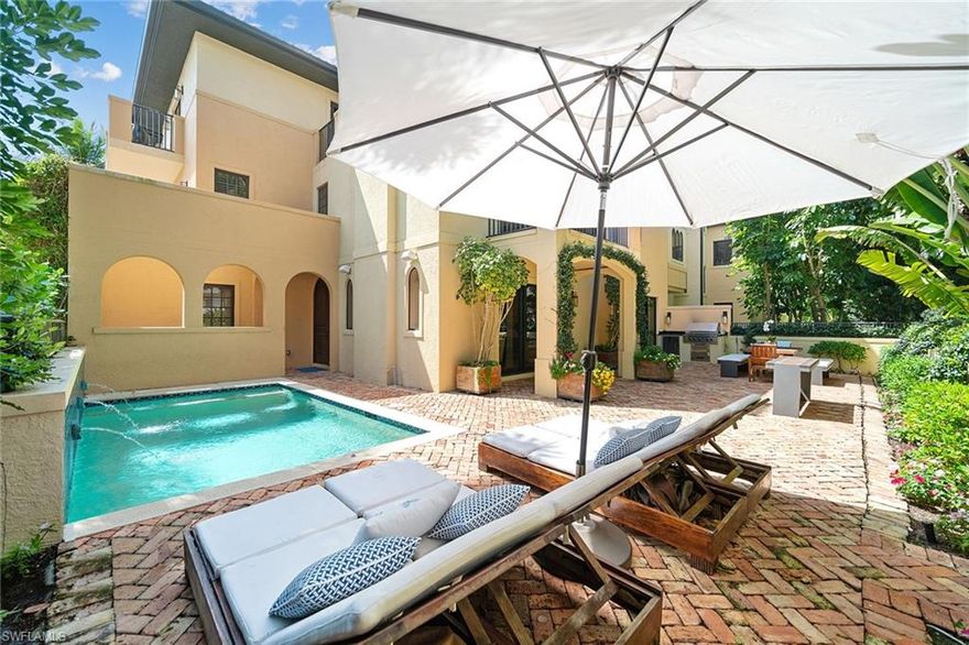 A rare Villas Escalante opportunity located in the heart of Old Naples, this stunning villa is just two blocks from the beach and steps to the restaurants, galleries and shopping on Fifth Avenue and Third Street. This three-level residence offers simple and crisp spaces, creating a seamless flow from room to room with white limestone floors, imported Italian wood and glass custom doors by Bosco and custom Siematic cabinetry in the kitchen and baths. A private interior elevator leads you to the additional floors featuring a fitness room, guest suites with German-imported custom closets, full marble bath and individual balconies. The spacious master bedroom suite and master bath features a soaking tub and Spanish marble. The exterior botanical garden setting complements the expansive interior courtyard and sparkling pool — a true downtown gem!