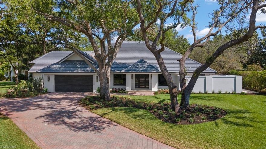 Tastefully renovated residence in the Oakmont community of Pelican Bay offered furnished for immediate move in. The spacious 3200 sqft under air, 4+den/ 3 bath offers exclusivity in one of Naples’ premier locations. Meticulously finished, this elegant estate boasts an open floor plan w/voluminous ceilings and a Northeast exposure, filling rooms with vibrant natural light. As you enter the home a Chef’s kitchen commands attention w/sharp modern lines, acacia wood paneling accents, Fisher Paykel appliances w/ quartz counters. The master corridor includes a walk in closet w/center island, master bath w/dual-vanity and soaker tub, and floor to ceiling slider doors for the perfect view of your pool. Stepping outdoors, the covered patio includes a TV and a fireplace, space to entertain, all housed by a tasteful sloped shiplap ceiling. Pelican Bay offers exclusive amenities such as 2 private beach pavilions, a full-service fitness center, professionally staffed tennis facilities and much more! Conveniently located just minutes from Mercato and the Waterside shops, and a short distance from 3rd Street South's and 5th Avenue South’s fine dining, world-class shopping and white sand beaches.