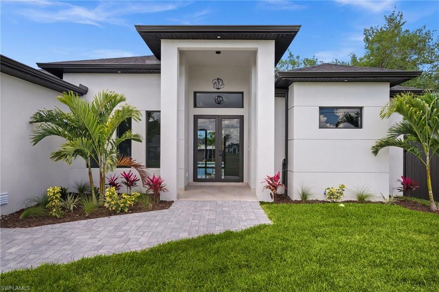 Stunning New Construction home in one of Cape Coral's fastest -growing areas!!! This beautifully crafted residences features a custom-designed kitchen, premium finishes , and high-quality details throughout. The open concept layout is filled with naturallight and seamlessly connects the living, dining and kitchen areas . Every space has been toughtfully designed with style , comfort , and functionality in mind. Enjoy your own private outdoor space with a beautiful pool , ideal for relaxing or hosting guests. Located in a quiet residential neighborhood with easy access to main roads , shopping, dining, and schools , this home offers the perfect combination of elegance , convenience , and investment potential. A true move in ready opportunity with exceptional design and quality.