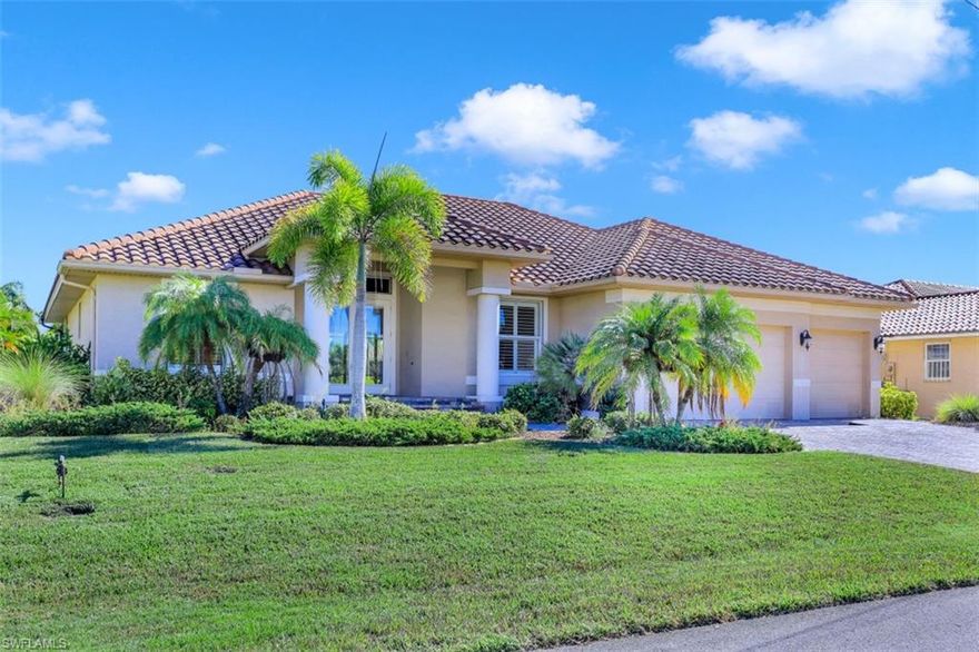 DIRECT GULF ACCESS Burnt Store Isles FURNISHED home w/ HEATED SALTWATER POOL! 3 bedrooms, each with their own en-suites and over 2300+ sf. OPEN CONCEPT floor plan with volume tray & coffered ceilings that allows for perfect natural lighting!  The spacious kitchen has rich dark wood cabinetry, Stainless steel appliances, breakfast bar, pendant lighting, tile backsplash, stunning GRANITE and a center island for great additional prepping/serving space. Tile throughout main living area with carpet in the bedrooms. Open the expansive sliders and enjoy the pool/water views and invite the inside out to the graciously sized pavered pool deck with screen enclosure and a pool bathroom. The master bedroom has ample space and his & her walk-in closets with wood shelving. The master ensuite has dual sinks, a separate make-up station, separate walk-in shower with a nice corner soaking tub. KINETICO WATER SYSTEM a bonus! The exterior of home has mature landscaping with professional lighting, pavered driveway that leads to a 3 stall garage, tile roof, seawall and concrete dock with water & electric available. This home is move-in ready!