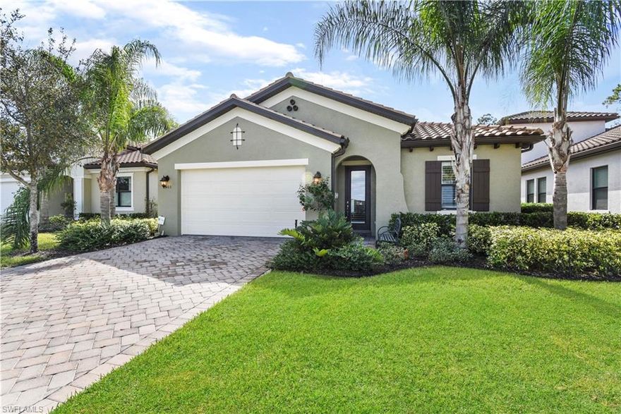 Fabulous WCI Built Pool home in one of the most beautiful gated communities in Naples! Raffia Preserve is a sprawling 184 acres speckled with lakes, preserve areas (72 acres), and resort-style amenities. Offering almost 2,300sf of under air living space, this home features an open floor plan, Gorgeous kitchen lots of storage, front sitting room (w/ closet), great room floor plan with 3-panel slider system giving this area a wonderful view, volume ceilings, crown molding, plantation shutters, custom window coverings, rear lanai with pavers on pool deck & a heated pool, 2 car garage with high-end epoxy coating on floor. Great views from both the front door & rear lanai with the home being situated across the street from a lake (there will never be a home built there) and backing up to a preserve area, very peaceful. There has only been one owner of the home since it was built in '15, and it has always been seasonally lived in & well maintained. For storm protection there is impact resistant doors & windows throughout home. Raffia Preserve is a gated neighborhood that features a Clubhouse with resort-style pool, a 2,000' fitness center, playground, and a basketball court.