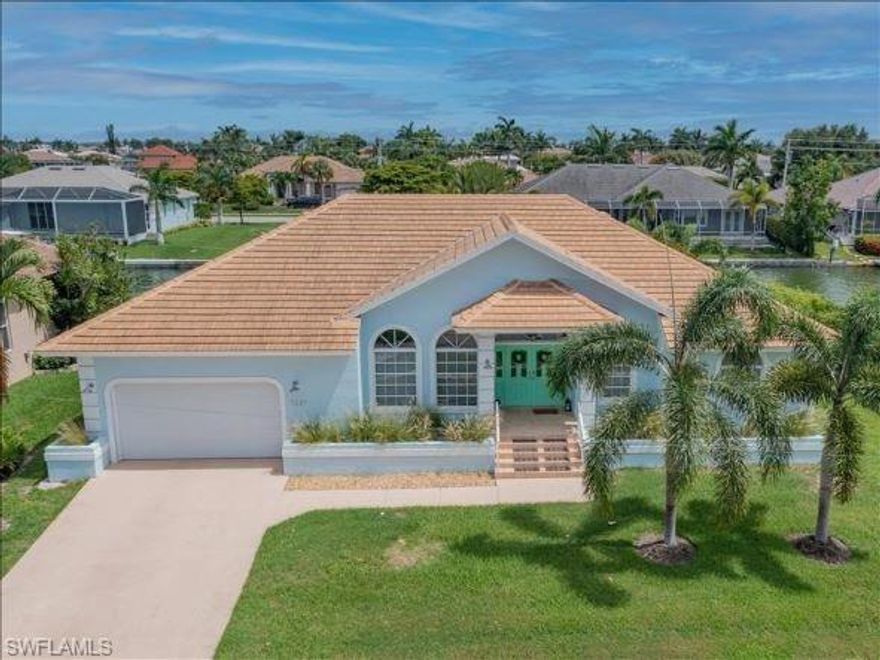 Very rare, direct access south-end waterfront home. Just two blocks to Winterberry Beach access and the island's entertainment district. Only 5 minutes to the gulf with no bridges to impede your boating experience. This immaculate open floor plan home features 3 bedrooms, 2.5 bathrooms, all remodeled in 2017, complete with new roof, AC, stainless steel appliances, water heater, and new tile throughout. Most recent improvements include a new hurricane rated garage door, boat lift motor (12,000 lbs), and pool pump. Open living space with plenty of seating for your family and friends. The bright kitchen is perfect for cooking or gathering, featuring stainless steel appliances and an abundance of new quartz counterspace, including a beautiful waterfall island. Enjoy a game of pool when you aren't spending time out in the sunshine. Experience the outdoor living we love so much right out the back door on this exclusive waterfront property. Close to beach, restaurants, movies, ice cream shop, miniature golf and more!