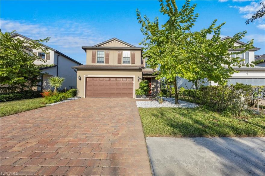 Welcome to this beautifully maintained two-story home in Avalon Park, located just minutes from Downtown Ave Maria. Enjoy breathtaking lake and sunrise views from your screened lanai, the perfect spot to start your morning or unwind in the evening. This 3-bedroom, 2.5-bath home offers 1,853 square feet of living space, featuring tile flooring downstairs and carpet upstairs for added comfort. The open-concept main living area flows seamlessly into the kitchen and dining space, while the upstairs loft provides an additional living or entertainment area.
Step outside to your own private tropical retreat. The lush landscaping includes a wide variety of mature fruit trees and garden plants, including passion fruit vines, tamarind, moringa, loquat, papaya, mango, lemon, guava, banana, sugar cane, and avocado, along with lantern plants and garden areas perfect for anyone who loves fresh fruit and outdoor living. Additional highlights include a two-car attached garage, screened lanai with lake views, ceiling fans, central electric cooling, and a washer and dryer in residence. Residents of Avalon Park enjoy access to community amenities such as parks, a dog park, fitness center, playground, tennis courts, and scenic biking and jogging paths.
Located in the heart of Ave Maria, this home offers the perfect balance of tranquility and convenience, close to shops, dining, and all the charm of this growing community.