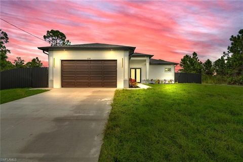 Photo of 539 Addison ST E, LEHIGH ACRES, FL 33974 (MLS # 2025019718)