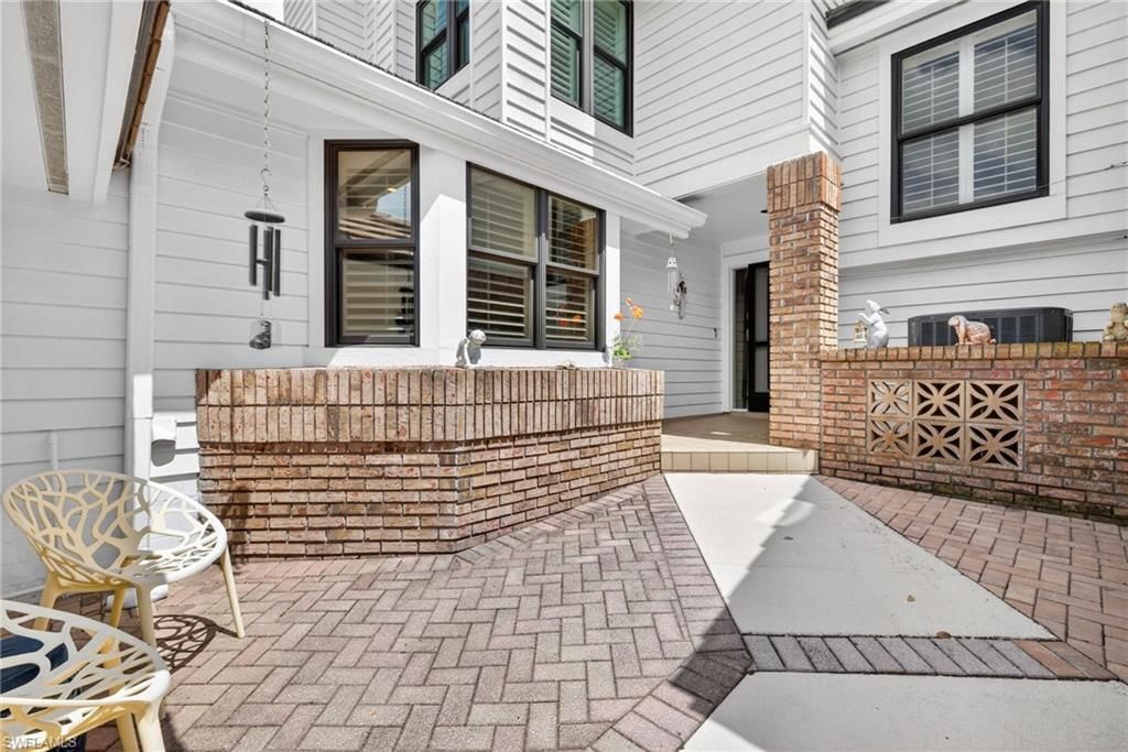 Photo of 4030 Crayton RD #C2, NAPLES, FL 34103 (MLS # 226020607)