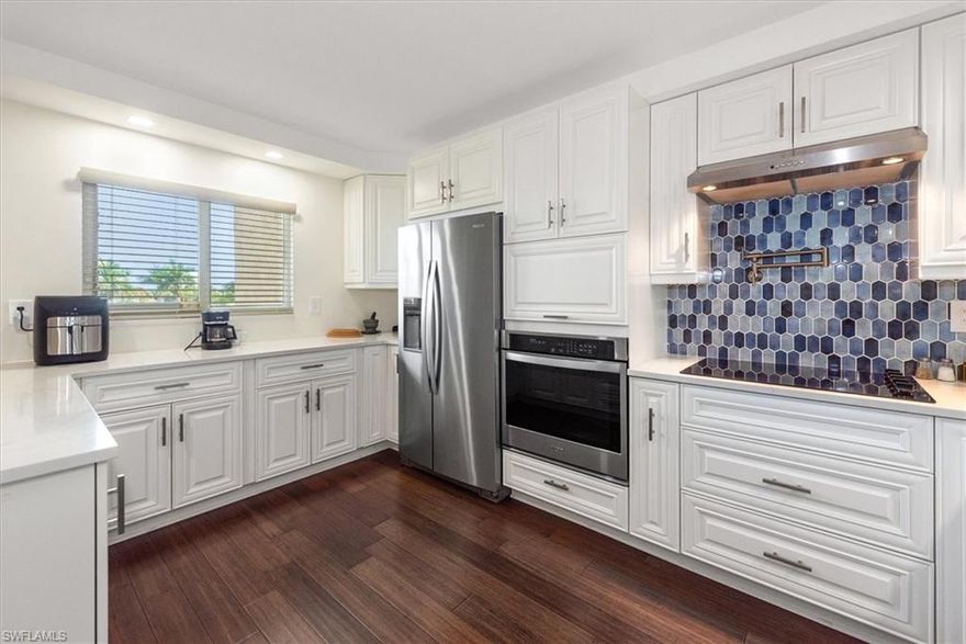 High end remodel in 2022 of a 3rd floor GULF ACCESS water view condo located in highly sought after Town and River.  Upgrades include IMPACT WINDOWS, New A/C + duct work, New electrical, New plumbing, New outlets, New fixtures, New wood floors, New stainless steel appliances, New custom tiled showers with fogless glass, a tankless water heater, dimmable LED lighting, electric window shades, and so much more! The kitchen is amazing -loads of soft-close white shaker cabinets, quartz coutertop, stainless appliances including wine fridge, pot filler at the stove, hidden microwave and pop out extra countertop space.   You’ll love the view from the main living area where you can enjoy watching the boats and a lovely sunset. There is one assigned parking space in the carport, along with outdoor storage. Speaking of storage - there is an unbelievable amount of storage space inside!  Great community Pool, tennis, pickleball, gym, kayak storage and gardening area are just some of the amenities. The Community boat dock has water and electric available, and can accommodate sailboats.  Desirable south fort myers location near Barbara B Mann entertainment center, FSW, fine dining, shopping, 2 hospitals, downtown Historic River District, FGCU and gateway to Sanibel and Fort Myers Beach Islands.  The international airport is 30 mins away.  Building has an Elevator.