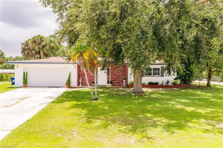 What a Gem!! MOTIVATED Owners have made many changes since home was first listed...This 3/2 split floor plan has new carpet in bedrooms, new bathroom vanities, gorgeous updated kitchen, roof, air condition and garage replaced in 2012  All nestled on a fenced in oversized corner lot.  Quiet neighborhood yet convenient to Cape Coral and the Heart of Ft. Myers.