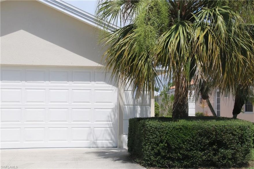 This 3 bedroom 2 bath home is located on arguably one the best streets in VILLAGE WALK...CENTRALLY LOCATED  and AWAY FROM ANY TRAFFIC NOISE, this is one of only a few 3 bedroom attached villas that were built in the community.  It is the LARGEST OF THE 3 BEDROOM REGENT MODELS, with the FULLY FINISHED LANAI AREA (1808 sq ft) as opposed to just the screened in lanai (1648 sq ft).  With PRIVACY WALLS on both sides, and a BIG SCREENED IN DECK with spa, OVERLOOKING THE LAKE, this home is very private and lives like a single family home....This home is being sold as is and needs some fixing up, but it is a solid 3 bedroom home in a great location...The roof is being fully replaced, as opposed to just being repaired, and money has been set aside in escrow for that purpose... Village Walk itself is a great centrally located AMENITY RICH NORTH NAPLES COMMUNITY...You are only @5miles to the beach and @3 miles to upscale dining, shopping and entertainment opportunities such as  Mercato... Southwest Florida International Airport is only 30 minutes away...Zoned for  VINEYARDS ELEMENTARY SCHOOL, NORTH NAPLES MIDDLE SCHOOL, and BARRON COLLIER HIGH SCHOOL...VERY REASONABLE HOA FEES AND NO CDD...