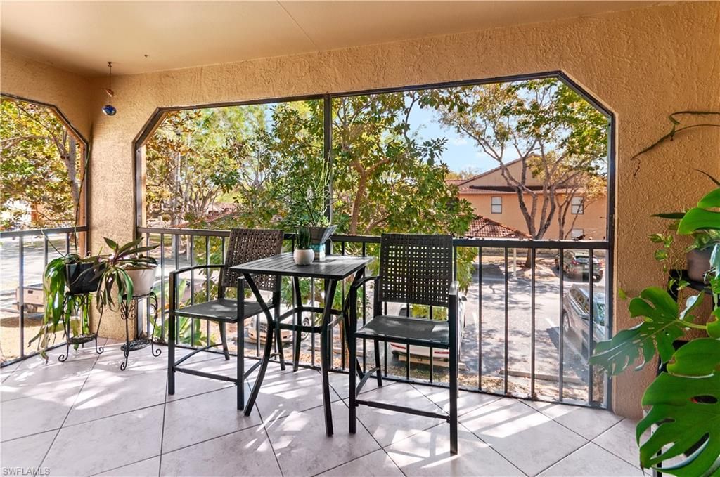 Photo of 2226 Arbour Walk CIR #1921, NAPLES, FL 34109 (MLS # 226012447)