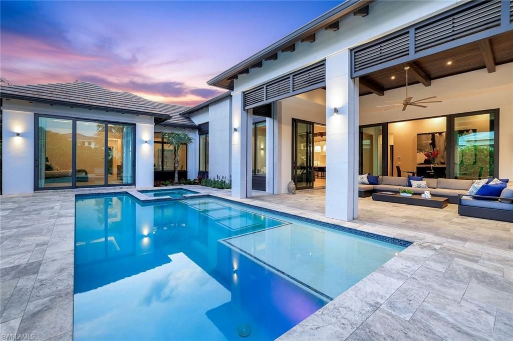 Photo of 541 Whispering Pine CT, NAPLES, FL 34103 (MLS # 225047112)