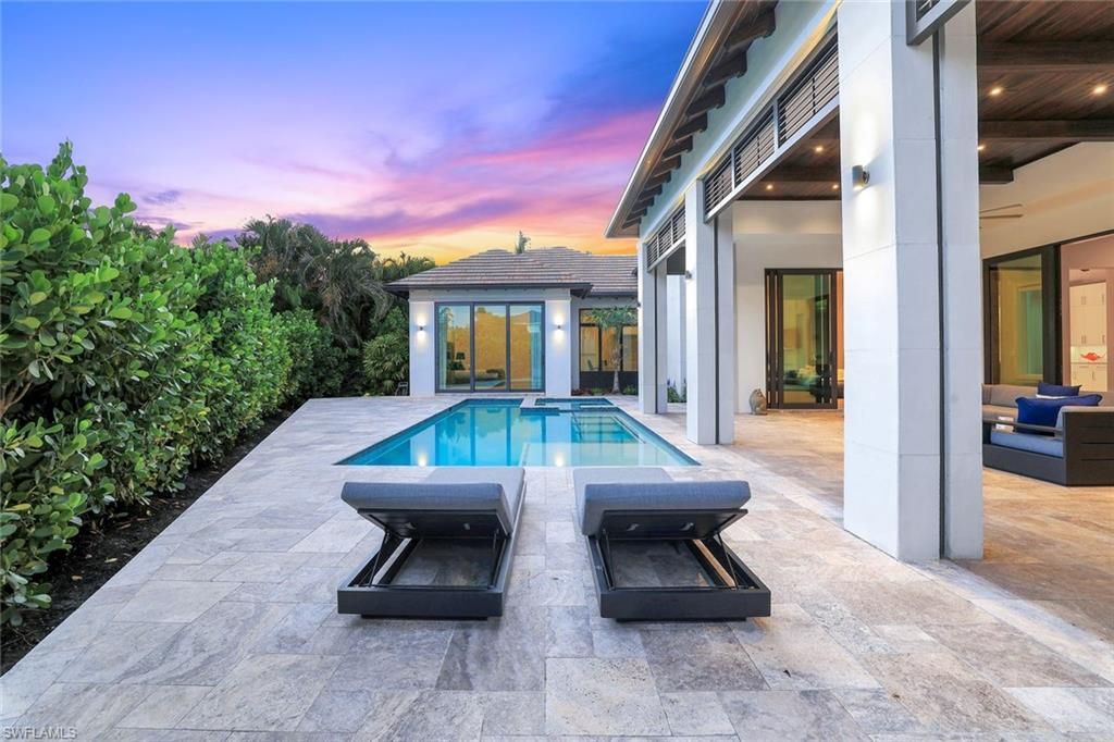 Photo of 541 Whispering Pine CT, NAPLES, FL 34103 (MLS # 225047112)