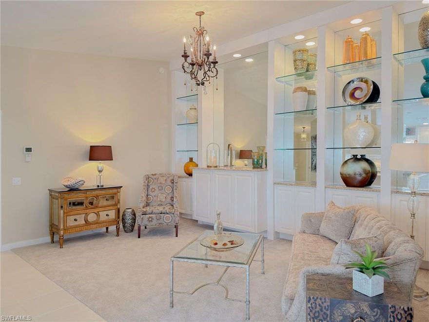 The highly coveted Island Walk community in North Naples presents this stunning, move-in-ready villa. Offering 1,680 square feet, one of the largest villa floor plans available, this exceptional residence is perfectly positioned along the tranquil waterway, showcasing picturesque views of Island Walk’s iconic bridges—an outlook that is truly difficult to match.
This beautifully maintained home offers volume ceilings, new HVAC (2023), elegant new carpeting, and snow-white tile flooring throughout. Plantation shutters adorn every window, and a central vacuum system adds convenience. The home is further enhanced by a new tile roof currently being installed, along with a freshly power-washed exterior and updated exterior paint detailing, ensuring both beauty and peace of mind.
Notably, this villa is designed for effortless living without the responsibility of a private pool, allowing you to enjoy Island Walk’s resort-style community pools without the added maintenance, insurance, and upkeep—an increasingly preferred choice among savvy buyers.
Located in a desirable X Flood Zone, this property offers favorable insurance advantages and includes manual hurricane shutters for additional protection.
Island Walk is renowned for its lush landscaping, scenic walking paths, and charming pedestrian bridges leading to the vibrant Town Center. Residents enjoy exceptional amenities, including resort and lap pools, a state-of-the-art fitness center, tennis and bocce courts, and the convenience of an on-site restaurant, post office, gas station, car wash, beauty salon, and nail salon.
Low HOA fees include HDTV, high-speed internet, and lawn care, delivering outstanding value while allowing you to fully embrace luxury living beneath the majestic laurel oaks in one of North Naples’ most sought-after gated communities.