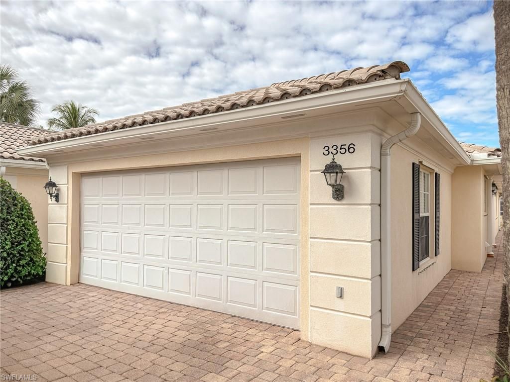 Photo of 3356 Cayman LN, NAPLES, FL 34119 (MLS # 226004970)