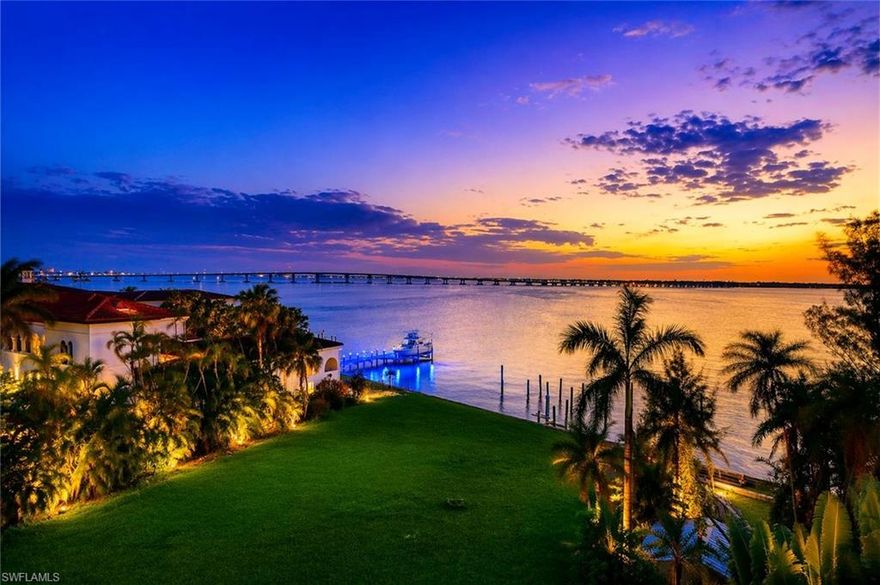 Panoramic riverfront views and 1.33 acres of privacy directly off McGregor Boulevard define this truly one-of-a-kind estate property along the Caloosahatchee River. Offering an extraordinary combination of acreage, DEEP WATER river frontage, and unmatched convenience, this rare opportunity allows you to enjoy miles of open water views, vibrant western sunsets, and quick access to shopping, dining, downtown Fort Myers, and area beaches by both boat and car.

Spanning nearly 8,000 total square feet, the estate consists of two residences across one expansive property, featuring a total of 8 bedrooms, 6.5 bathrooms, multiple living and entertaining spaces, and a 6+ car garage, ideal for collectors and enthusiasts. With approximately 141 feet of shoreline, this stretch of river is known for its exceptional width and deeper water depth, accommodating larger vessels and delivering the sought-after “big water” views rarely found in Fort Myers.

Designed with entertaining and lifestyle in mind, the property is highlighted by an extraordinary 2,600-square-foot rooftop terrace with 360-degree panoramic river views. Complete with a full outdoor kitchen, bar, and lift access for seamless service, this space is perfectly suited for hosting private gatherings, corporate events, or unforgettable sunset evenings with family and friends.

The original residence, built in 1972, offers 5 spacious bedrooms and 3 bathrooms, showcasing timeless architectural character and solid construction. The second residence, added in 2003, provides 3 additional bedrooms, 3.5 bathrooms, and a substantial 6-car garage, making it ideal for multi-generational living, guest accommodations, or a private retreat. Positioned along one of Fort Myers’ most iconic corridors, near the historic winter estates of Edison and Ford Winter Estates, this location is synonymous with prestige, history, and natural beauty. Enjoy a short drive to Downtown Fort Myers, where you’ll find a vibrant mix of dining, entertainment, and cultural attractions, including favorites like The Veranda, Oxbow Bar & Grill, Izzy’s Fish & Oyster, Ford’s Garage, and Firestone Grill Room. The area also hosts renowned events such as the Edison Festival of Light and ArtFest Fort Myers, along with weekly art walks, farmers markets, and waterfront events. Surrounded by riverfront parks, boutique shopping, the scenic promenade, and landmarks like the Luminary Hotel & Co., this property offers a lifestyle that blends privacy, convenience, and energy. Framed by sweeping water views and glowing sunsets, this exceptional riverfront estate presents a once-in-a-generation opportunity to own one of Fort Myers’ most significant waterfront properties. This is a property that cannot be assembled again. 1.33 acres. 141 ft deep-water frontage. Two residences. 2,600 SF rooftop terrace. McGregor Boulevard. The combination together simply does not exist anywhere else in Fort Myers.