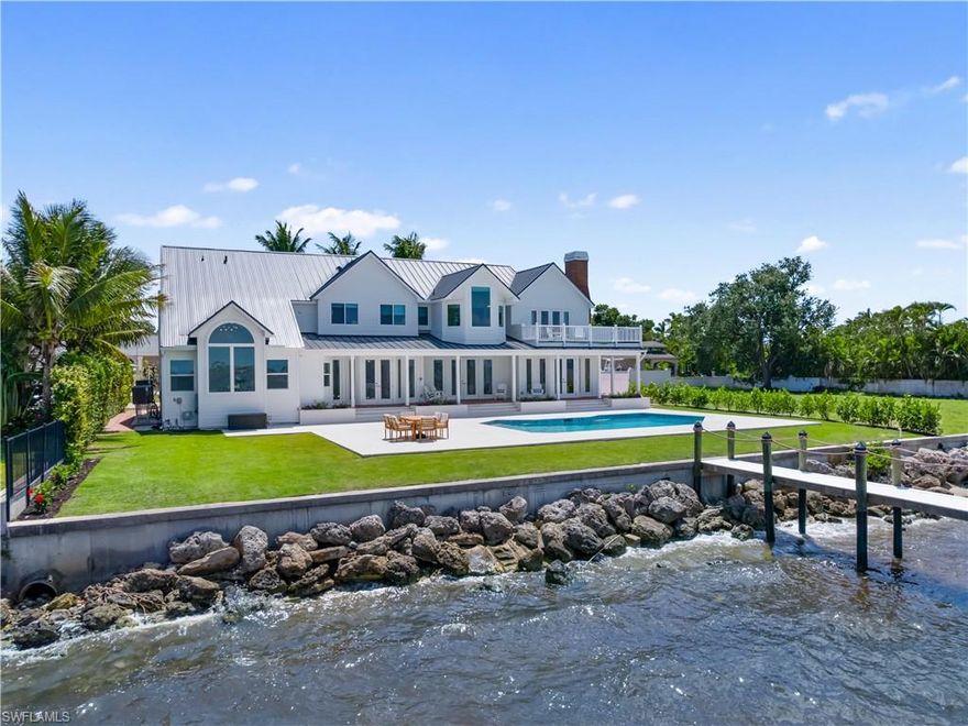 Stunning and totally Awesome, this two-story waterfront residence offers direct boating access out to the bay and gulf waters located off Historic McGregor Blvd close to everything SWFL has to offer. Whether you're hosting weekend pool parties, enjoying quiet riverfront mornings, spectacular sunsets or creating unforgettable memories with loved ones, this home is the perfect setting to raise a family and grow roots. Inside this beautifully furnished home, you will enjoy multiple living areas, a chef's kitchen with a center island, double ovens, double dishwashers, an ice machine, a walk-in pantry, a wine cooler, and custom cabinetry. The expansive layout includes 5+ bedrooms, a home office, media room, den, loft, and a luxurious owner's suite featuring a private river-view sitting area, second laundry room, coffee bar, and a spa-like bath with dual sinks, a soaking tub, and multiple showerheads. Soaring vaulted ceilings, a cozy fireplace on each floor, built-in surround sound, NEW ROOF, impact-resistant windows and doors add comfort and peace of mind. As for the guest rooms, they are spacious and private. SPOIL ALERT, Your kids will love the secret passage play zones this home offers. You must see to understand. Special & Fun! Outside, enjoy a heated saltwater pool, a ginormous pool deck-back yard area, lush landscaping, fantastic covered porch areas, western exposure for breathtaking sunsets, direct access boating with no bridges, complete with a private composite dock, boat lift, jet ski lift, and utilities at the dock. Located in a non-gated, no-HOA neighborhood just minutes from downtown Fort Myers by boat or car, this riverfront retreat blends privacy, luxury, and lifestyle in one unforgettable address. Bonus opportunity: the adjacent lot is also owned by the seller and may be available for purchase if there is interest, an ideal option for added privacy, expansion, or investment.