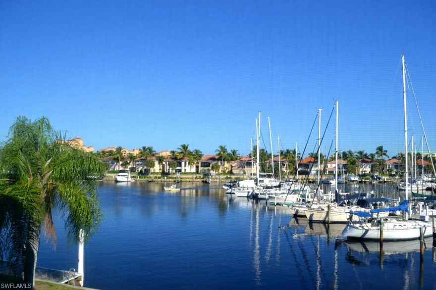 Generate $6,000 Immediate Income on this charming 1BR/1BA 2nd floor waterfront condo at Burnt Store Marina that has reservations booked for Jan - March 2015!  Perfect as a seasonal rental or winter get-away, this cheerful condo offers tile flooring throughout and tranquil views of swaying palms that accentuate the view of boats moored in Burnt Store Marina's south basin.  Steps away from waterfront dining at Cass Cay and The Trading Post which offers breakfast items, sandwiches, beer & wine, along with home made ice cream!  Walk the docks and appreciate the variety of power and sailing vessels that are literally docked in your backyard. Equipped with a sleeper sofa, this efficiency can accommodate 4 when necessary, but offers a perfect vacation for two!  Come to gated Burnt Store Marina and explore awesome boating and renowned fishing in Charlotte Harbor and the Gulf of Mexico.  Additional ala carte amenities include tennis & fitness center along with 27 hole golf course, pro shop and Linkside Café.