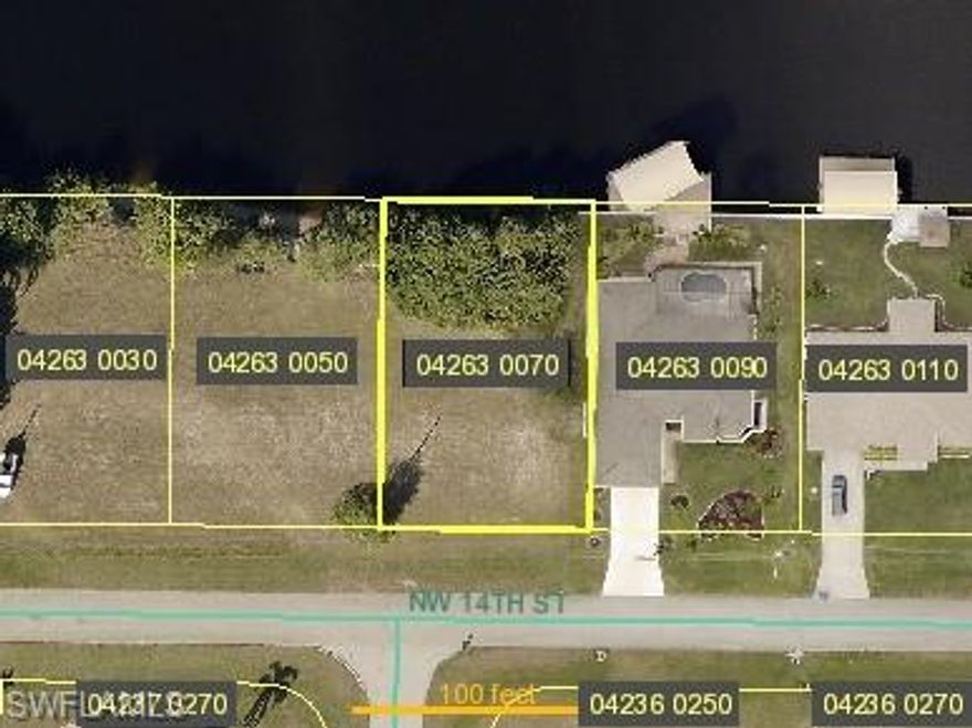 Nice Lot on Gulf Access Canal, close to the planned 7-Island Development. Lot sits between to 2 intersection canals. Area of almost all new upscale houses. The perfect lot to build your dream home on.