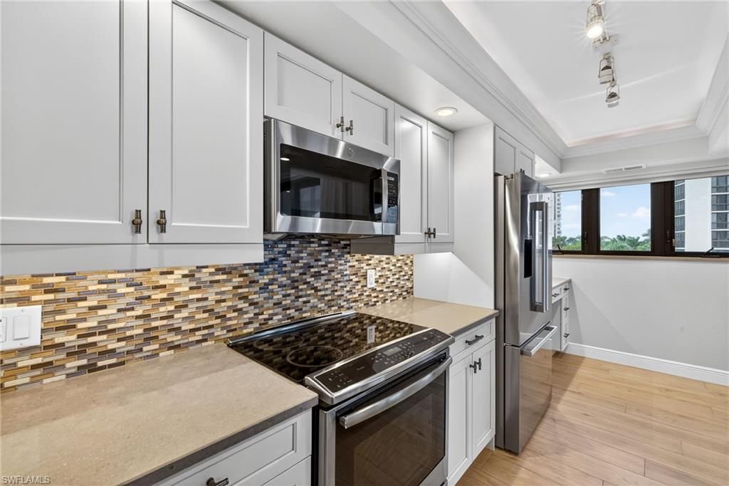 Photo of 6020 PELICAN BAY BLVD #E402, NAPLES, FL 34108 (MLS # 226005653)