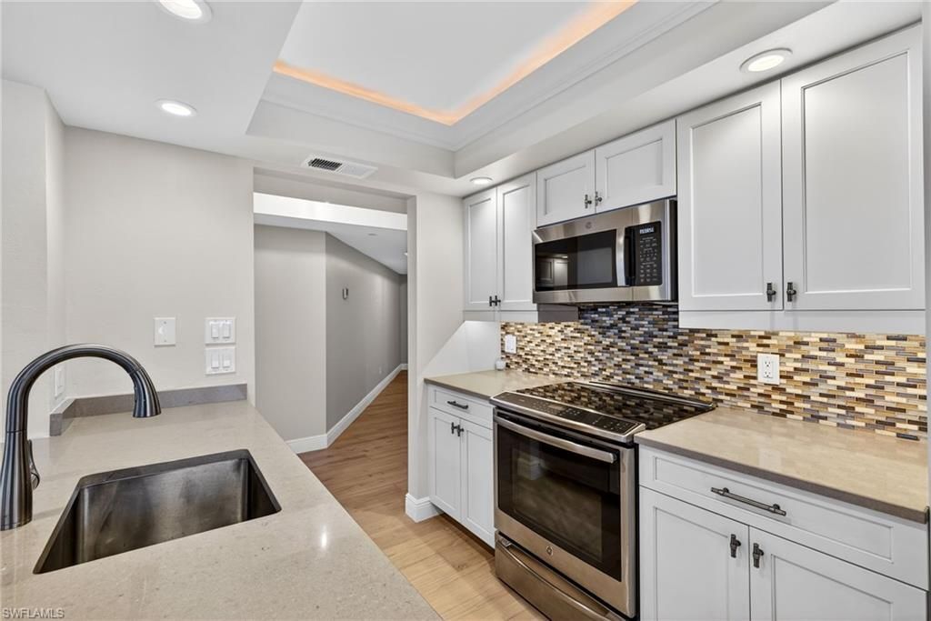 Photo of 6020 PELICAN BAY BLVD #E402, NAPLES, FL 34108 (MLS # 226005653)