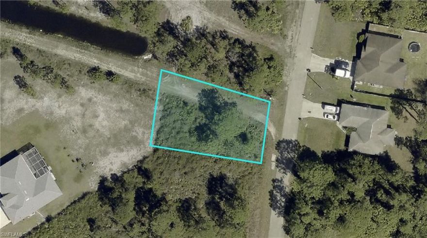 Prime vacant lot in Lehigh Acres! This buildable property is located in a peaceful, fast-growing area surrounded by new homes. The lot is not in a flood zone and sits outside of any HOA, giving you flexibility for building your custom home or holding as a long-term investment.
Close to schools, shopping, dining, and major roadways, this lot offers excellent convenience and strong future value in one of Southwest Florida’s fastest-growing markets. Don’t miss this opportunity to own a high-potential lot in thriving Lehigh Acres!