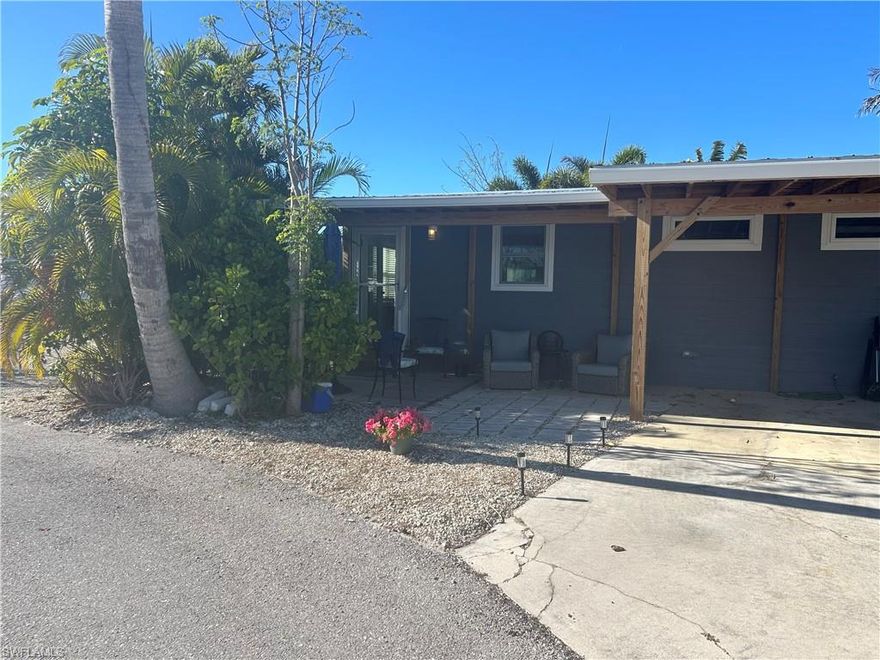Welcome to Dewberry Lane. Nicely redone 2/2 modular home (not a mobile home). The home sits parallel to the canal providing wonderful water views from many windows. There is a large great room on the canal side complete with pullout sofas to provide plenty of space for guests and family. This home was beautifully remodeled in 2025 and a new metal roof installed in 2025.