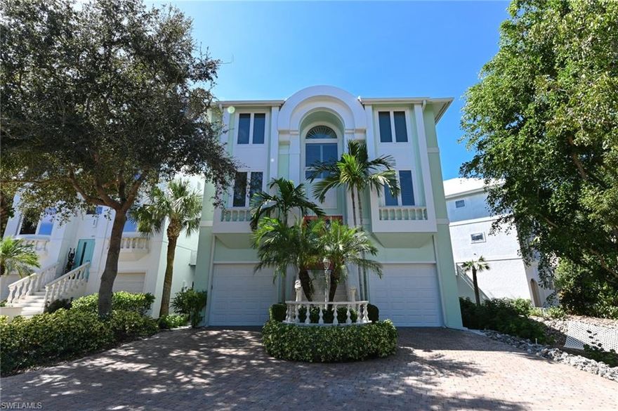 This Gulf front single family home is located in the Cottages at Barefoot Beach. This 3 story home includes 6 bedrooms plus a den and five baths. Amenities include bamboo and marble flooring, wetbar, private elevator, crown molding, granite countertops, upgraded appliances and much more! Enjoy beautiful sunsets from your master suite, living room or on the beach just steps from your back door. Beach club membership and dock lease available - see Broker for details.