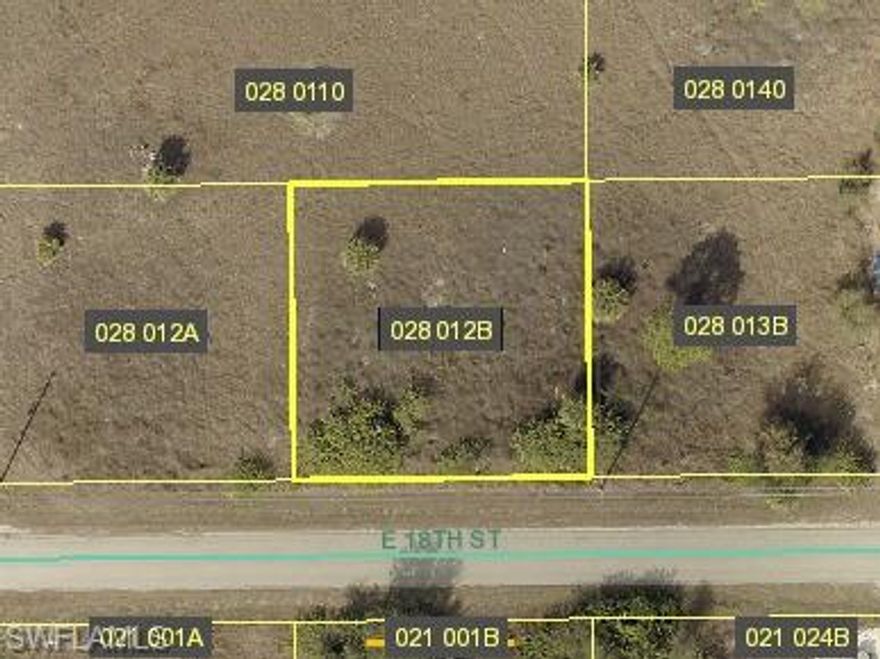 Nestled in the serene community of Lehigh Acres, this expansive vacant lot at 3803 E 18th St offers an incredible opportunity to build the home of your dreams. Situated in a peaceful neighborhood, this parcel provides a perfect blend of tranquility and convenience, with easy access to local amenities, schools, parks, and shopping centers. Surrounded by Florida's natural beauty, the property boasts a picturesque setting with mature trees and native vegetation, offering privacy and serenity. Whether you envision a modern architectural masterpiece or a cozy family retreat, this lot serves as a blank canvas for your creativity and vision. As a rapidly growing community, Lehigh Acres presents an excellent investment opportunity, making this lot a valuable piece of Florida paradise. Essential utilities are readily accessible, simplifying the building process and reducing construction costs. Enjoy the best of both worlds with proximity to Fort Myers, beautiful Gulf Coast beaches, and a variety of recreational activities, including golf courses and nature trails. Don't miss this rare chance to own a piece of paradise in one of Florida's most desirable areas.