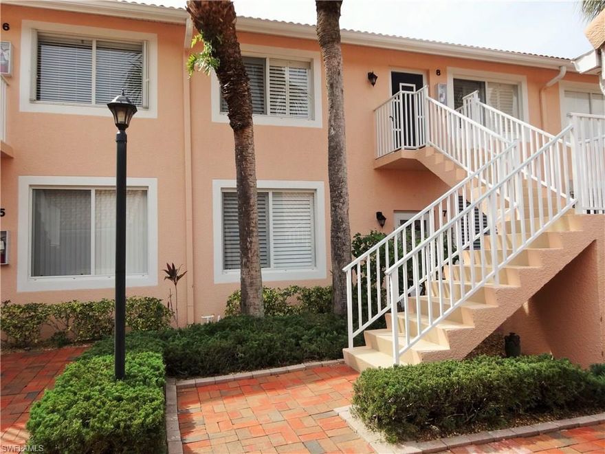 Lovely, light and bright Falling Waters Beach Resort 2 Bedroom 2 Bath condo on second floor! Detached 1 car garage.  Double Lake Views with fountain and also a view of the volcano which is lit at night!  Tile throughout the main areas of the home which has been extremely well maintained.  New A/C unit (2014), dishwasher (2014), dryer (2012) garage door (2013) and electric storm shutters along the long lanai installed in 2007.  Spacious entertaining Living Room and Dining Room area, great eat-in kitchen, fabulous lanai with wonderful views and Summer kitchen. This home has vaulted ceilings, comes fully furnished and also has a great laundry room with folding area and a laundry tub!  Plantation Shutters in the eat-in kitchen area and the 2nd bedroom.  Falling Waters Beach resort offers a 600' lazy river, large clubhouse, brick paver walkways & parking areas, shuffleboard court, tennis center, bocce ball court and lap pool!