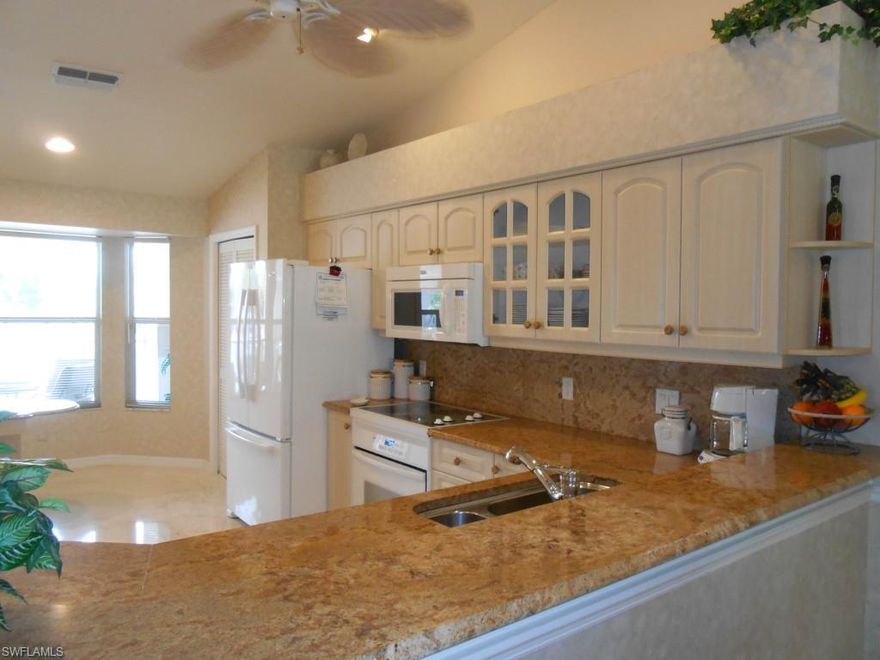 Totally remodeled 2nd floor end unit Veranda in Olde Hickory Golf & CC. 2 Lanais with the rear one having  a spectacular view of the 8th hole and pond. Upgrades in all rooms. Marble and granite throughout. Interior walls & trim recently painted. New Hurricane Proof windows and electric roll down shutters. 3 yr old high end appliances, new air conditioning and Water heater. Furnished Turnkey. Olde Hickory is a bundled golf community with only 561 homes. You CAN golf here even in high season. Golf course was completely re-done last year. Brand NEW state of the art Fitness Center, NEW Mens and Ladies locker rooms and NEW course baths. Close to the Boston Red Sox AND Minnesota Twins Spring training parks. Excellent restaurant and the $800 annual food & beverage minimum includes ALL beverages.
