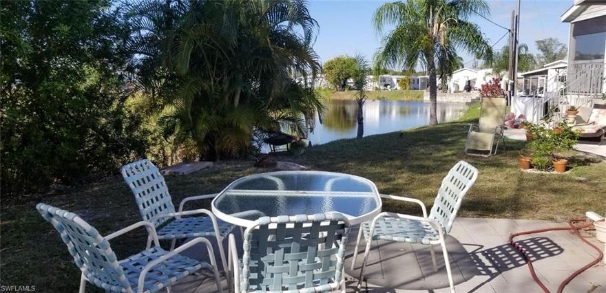 Easy to show.  Absolute bargain and looks great inside.  This well-maintained doublewide manufactured home is in the perfect location to enjoy south Florida paradise! Located in a friendly, 55+ deeded community with NO HOA fees and You Own The Land. Beautiful newer floors and windows. The air conditioner is only a year old.  The neighborhood has block parties, garage sales, and holiday gatherings.  Membership worth $1500. is included accessing the heated pool, shuffleboard, bocce ball, library, fitness center, card room and more.  Be sure to stop by and see it today!