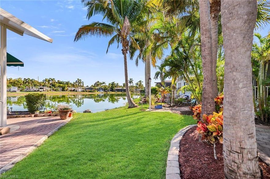 Golf cart included! Built in 2022 and offered furnished, this inviting waterfront residence in Silver Lakes blends modern construction with relaxed Florida living in a peaceful setting. Overlooking tranquil water views, the home features a spacious screened porch and an adjoining deck that together provide the backdrop for morning coffee, evening sunsets or easy outdoor entertaining. Impact-resistant windows and a newer Goodman HVAC (2020) with a 2022 condenser ensure comfort and peace of mind, while the home’s fresh, thoughtfully selected finishes make it feel move-in ready. Inside, the floor plan includes two bedrooms and two baths, enhanced by laminate flooring and ceiling fans throughout to maintain a light and breezy ambiance. The kitchen is beautifully designed with crown molding, recessed lighting, white cabinetry and newer LG stainless steel appliances, including a refrigerator, cooktop and dishwasher (all 2022), and a convenient two-seater island. In the living room, glass sliders open to the screened porch, creating a seamless indoor-outdoor flow that maximizes the home’s waterfront setting. The living room continues the cohesive design with crown molding and a comfortable layout ideal for everyday living or hosting guests. The primary bedroom offers a peaceful retreat with a walk-in closet, while the en-suite bath features white cabinetry and a walk-in shower with a glass slider. The guest bedroom is bright and inviting, paired with a nearby guest bath complete with matching white cabinetry and its walk-in shower with a glass slider. A dedicated laundry room adds valuable convenience with a full-size LG washer and dryer (2022), as well as overhead cabinetry for additional storage. Residents enjoy a wealth of community amenities, including a pristine golf course, two clubhouses, heated swimming pools, hot tubs, an all-weather tennis court, pickleball courts, six shuffleboard courts, bocce ball, six regulation horseshoe pits and a well-equipped exercise facility. With modern features, waterfront tranquility and resort-style amenities, this home offers an exceptional opportunity to enjoy the best of Naples living.