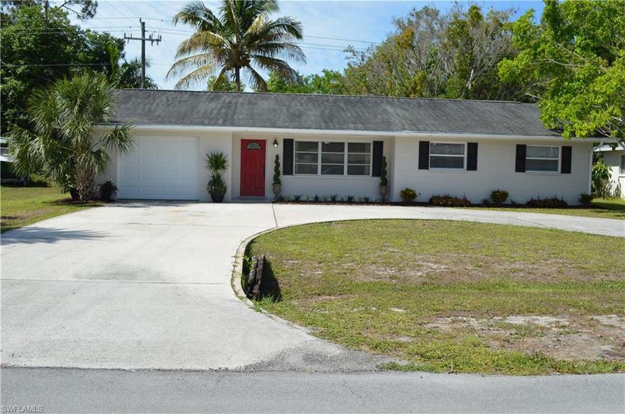 Welcome home to this beautiful house in the highly sought after Ft. Myers Villas! This home has it all; New kitchen, appliances, flooring, windows, bathrooms, plumbing, electrical, A/C and duct work all as of 2/2015! The gorgeous engineered hardwood floors, granite counters and beautiful details such as wall moldings and fresh paint make this home a must see. Kitchen has beautiful cabinetry with soft close doors and top of the line new appliances such as cook top and Bosh refrigerator. The bathroom tile is beautiful and complements the new vanities and light fixtures perfectly! Master suite is spacious and the guest rooms have lots of natural light. The dining area is so bright and airy due to the French doors leading to the newly screened lanai. This is the perfect spot to sit and enjoy the large yard and mature trees. The outdoor patio is perfect for grilling or just sitting in the sun. Lots of storage and shelving in the garage and laundry room, which is equipped with utility sink and washer/dryer. This property has been redone and is immaculate, shows like a model with many decorator touches throughout. Great location close to US41. Schedule your private showing today!